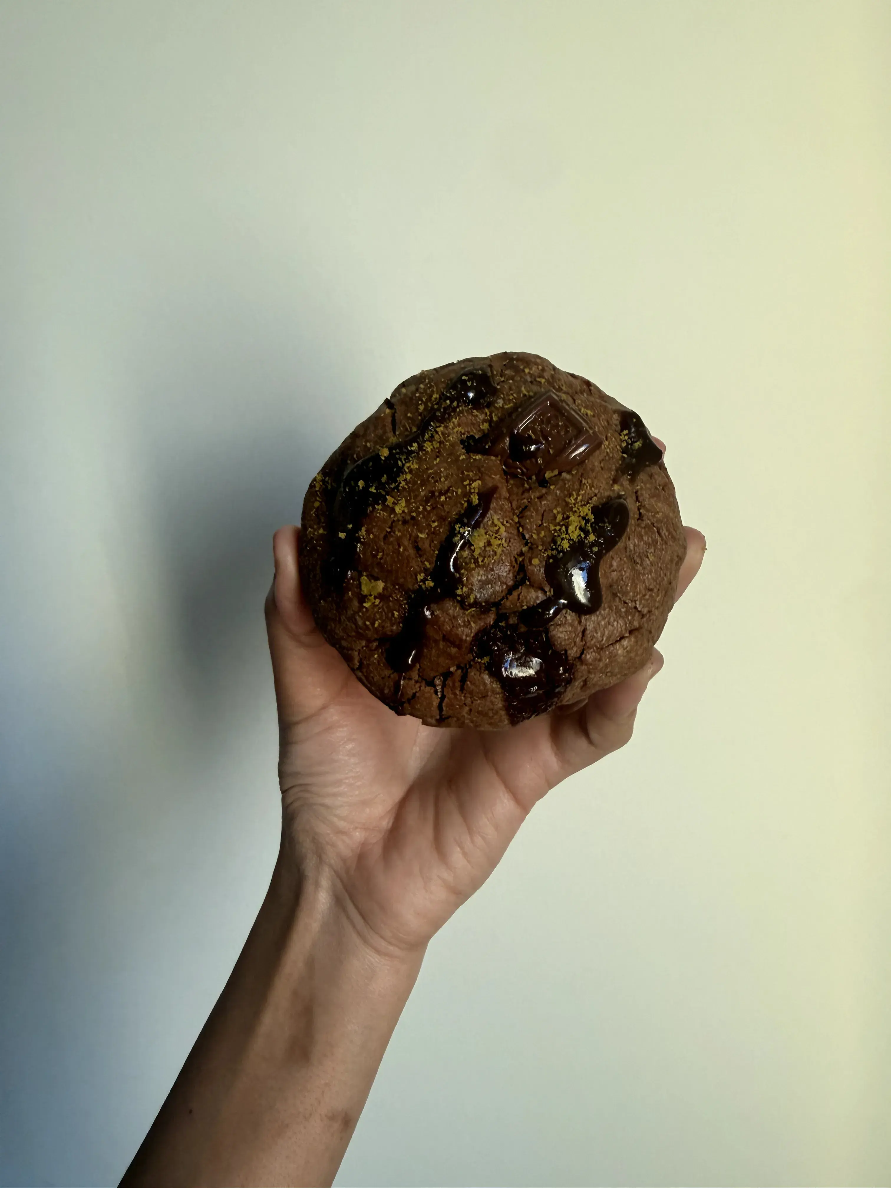 Aidu Bakes Dubai Chocolate cookie filled with pistachio cream and crispy kataifi, finished with milk chocolate