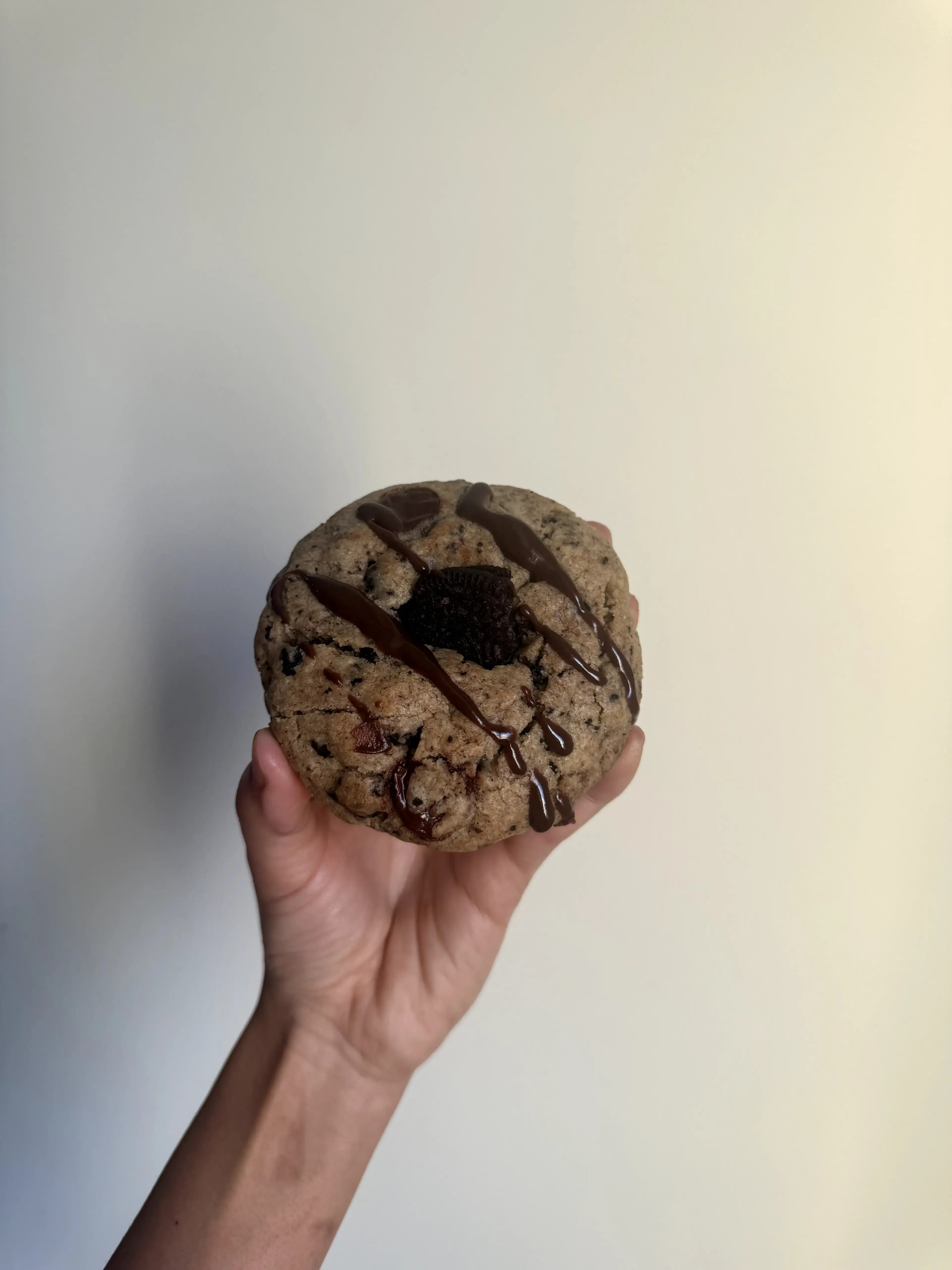 Aidu Bakes Oreo cookie stuffed and topped with crushed cookies-and-cream pieces