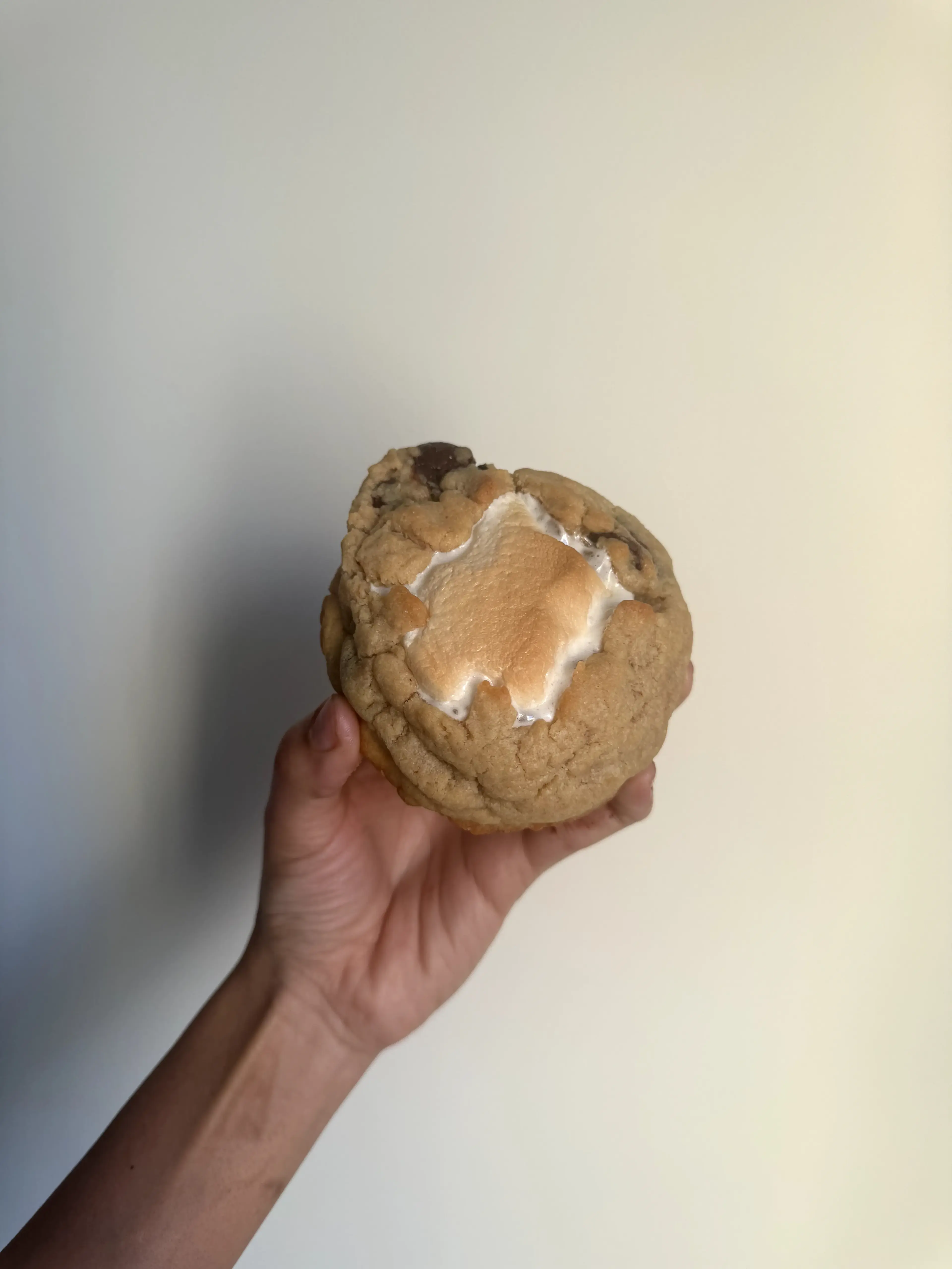 Aidu Bakes S'More cookie topped with toasted marshmallow, graham crumble and milk chocolate squares